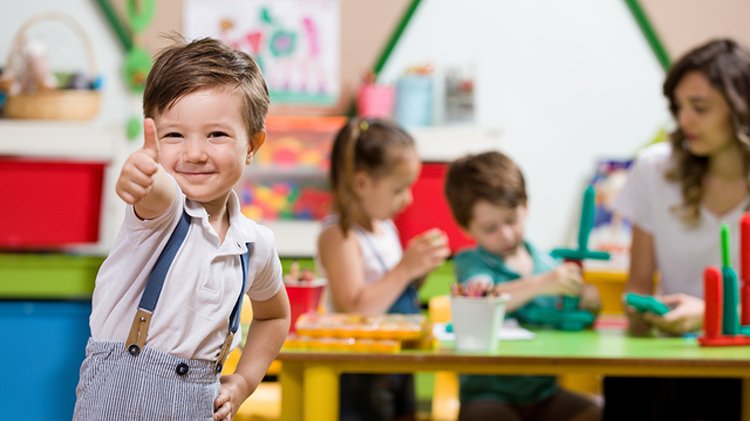 Children building confidence through hands-on classroom activities.