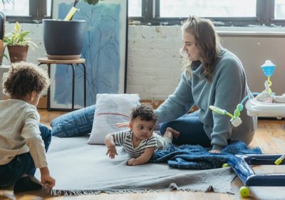 Children learning with teacher support during extended daycare hours